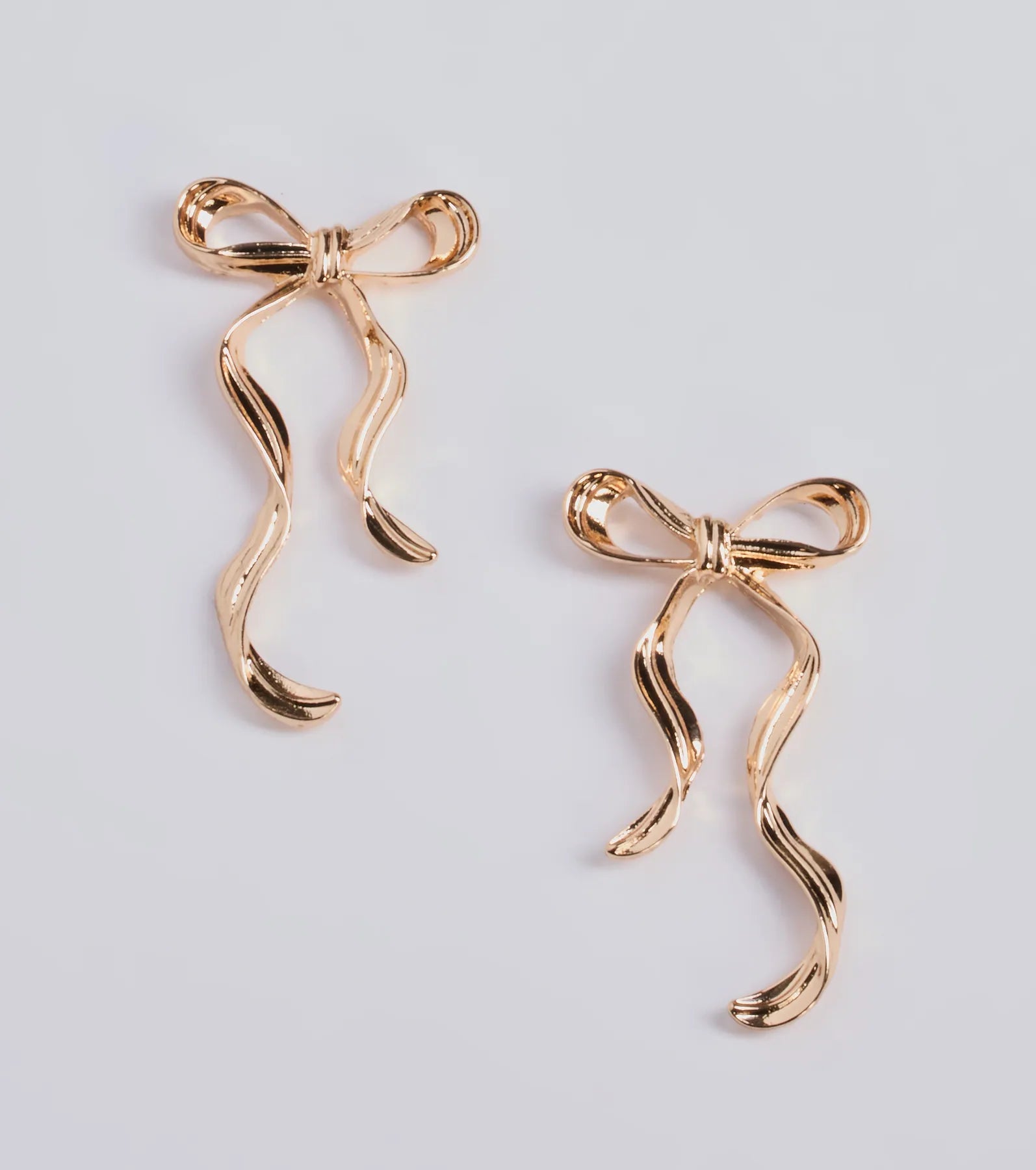 Ultimate Glamour Long Bow Stud Earrings - Premium Elegance