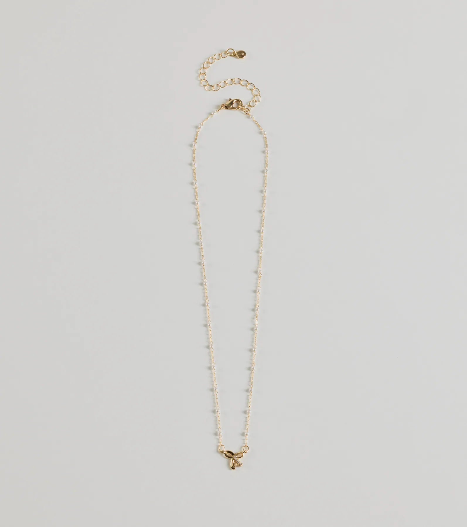 Ultimate Glamour Bow Charm Necklace with Faux Pearls